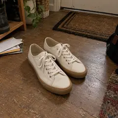 cream canvas low-top sneakers, as photographed