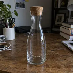 clear narrow-neck glass carafe, as photographed