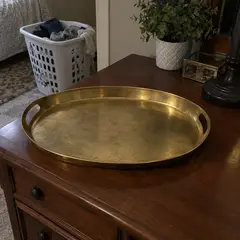 oval brass serving tray, as photographed