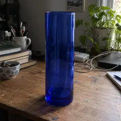 translucent cobalt cylindrical glass vase, as photographed