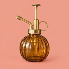 amber glass plant mister, as a cover photo