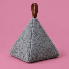 gray felt pyramid doorstop, as a cover photo
