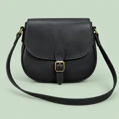 black leather saddle crossbody bag, as a cover photo