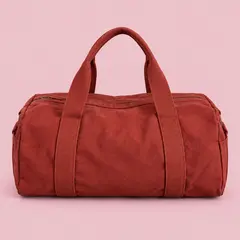 brick-red canvas duffel bag, as a cover photo