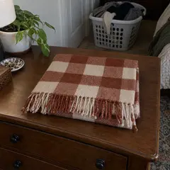 folded rust-and-cream checked woven scarf, as photographed