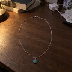 silver chain necklace, as photographed
