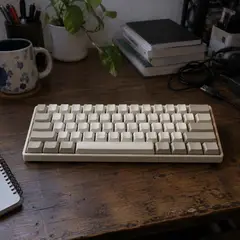 compact cream mechanical keyboard, as photographed