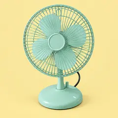mint small metal desk fan, as a cover photo
