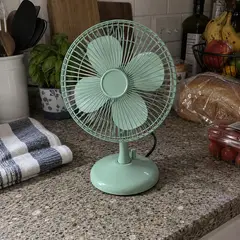 mint small metal desk fan, as photographed