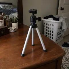 small silver tabletop tripod, as photographed