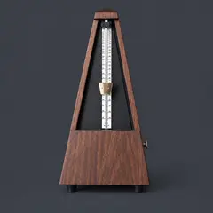 walnut pyramid mechanical metronome, as a cover photo