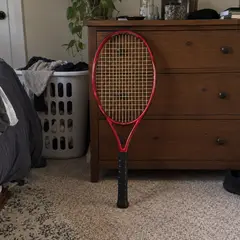 red tennis racket, as photographed