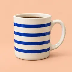 cream ceramic mug, as a cover photo