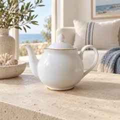 white porcelain teapot, moved into a new room