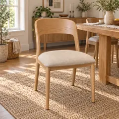 pale oak armless dining chair, moved into a new room