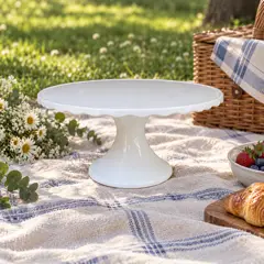 white ceramic pedestal cake stand, moved into a new room
