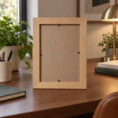 empty pale oak rectangular photo frame, moved into a new room