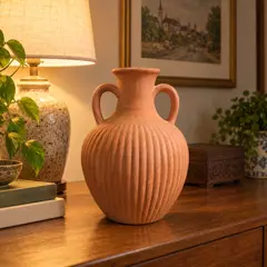 terracotta ribbed bulbous vase, moved into a new room