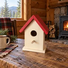 small pale wood birdhouse, moved into a new room