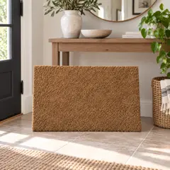 rectangular natural coir doormat, moved into a new room