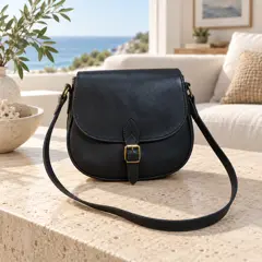 black leather saddle crossbody bag, moved into a new room