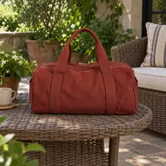 brick-red canvas duffel bag, moved into a new room