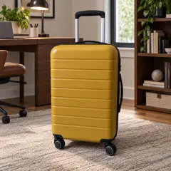 mustard hard-shell carry-on suitcase, moved into a new room