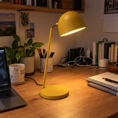 mustard-yellow metal desk lamp, moved into a new room