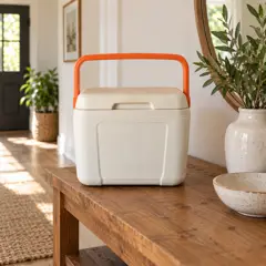 cream small hard-shell cooler, moved into a new room