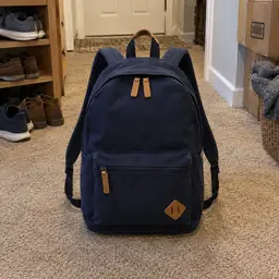 navy canvas backpack, as photographed