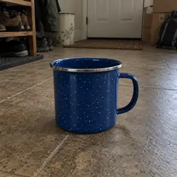 blue speckled enamel camping mug, as photographed