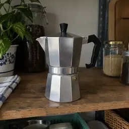 silver octagonal stovetop espresso maker, as photographed
