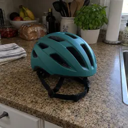matte teal cycling helmet, as photographed