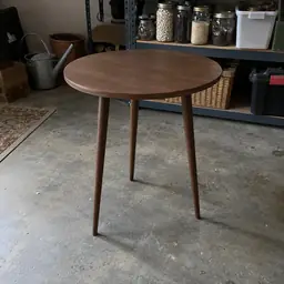 walnut circular side table, as photographed