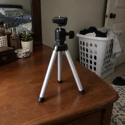 small silver tabletop tripod, as photographed