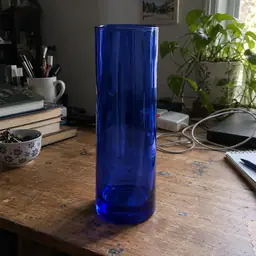 translucent cobalt cylindrical glass vase, as photographed