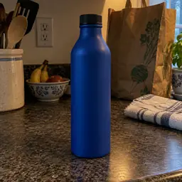matte cobalt-blue aluminum water bottle, as photographed