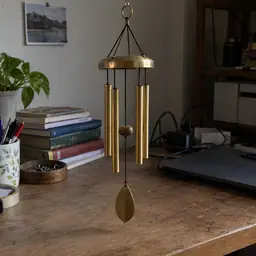small brass wind chime, as photographed